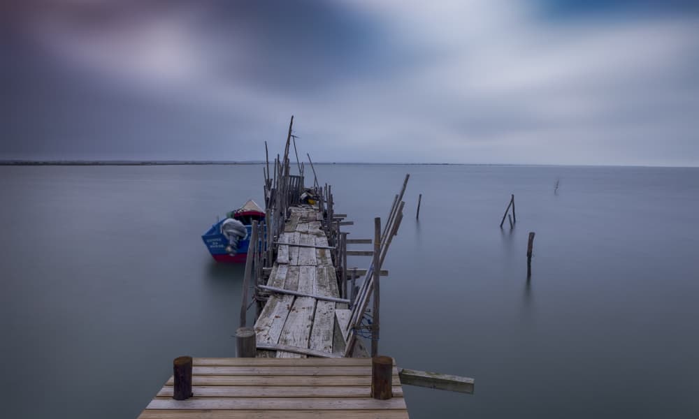 Moody Pier Serenity by JUAN CARLOS HERVÁS MARTÍNEZ — canvas wall art