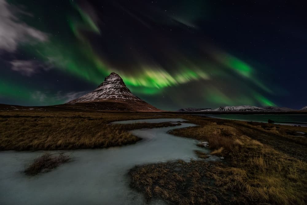 Majestic Aurora Over Kirkjufell by Javier de la Torre — canvas wall art