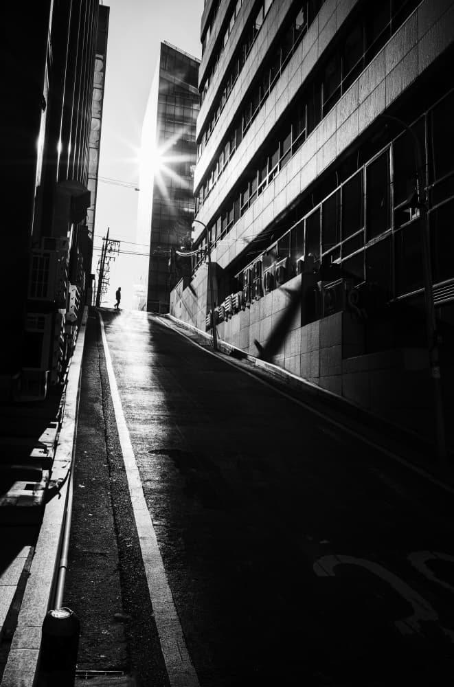 Uphill City Sunburst by Swen MUN — canvas wall art