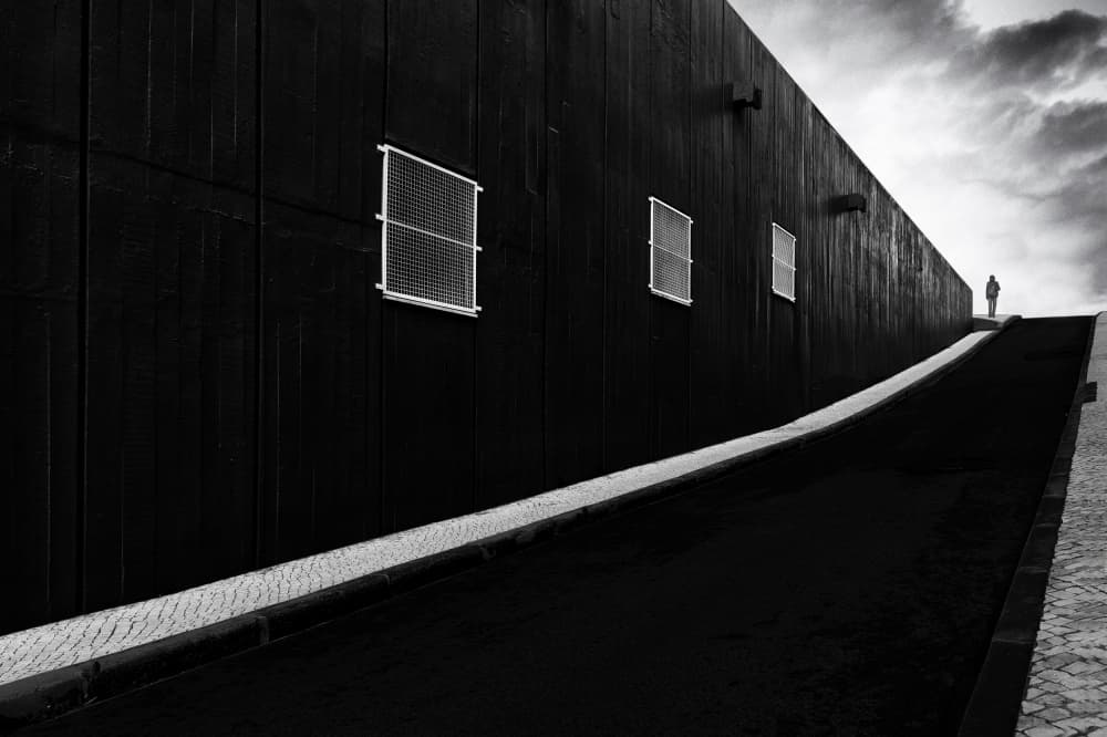 Lone Figure On Dark Road by Paulo Abrantes — canvas wall art