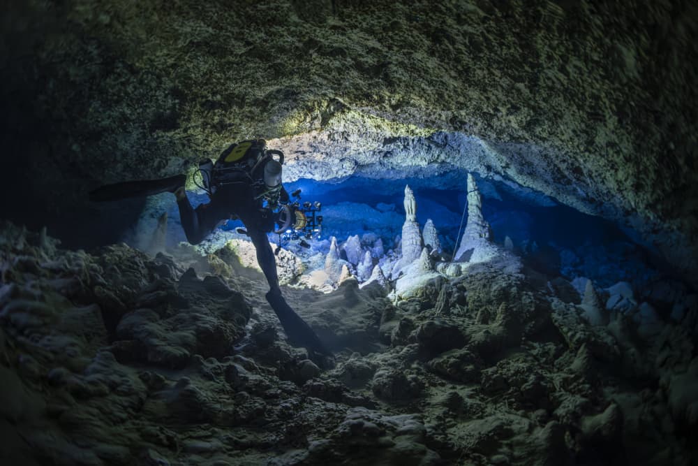 Diver Explores Underwater Cave by Barathieu Gabriel — canvas wall art