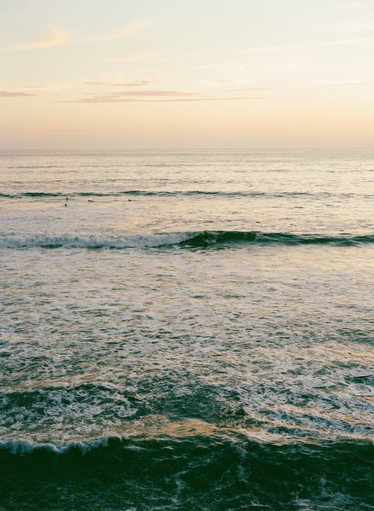 Serene Ocean Surfers by Bethany Young — canvas wall art