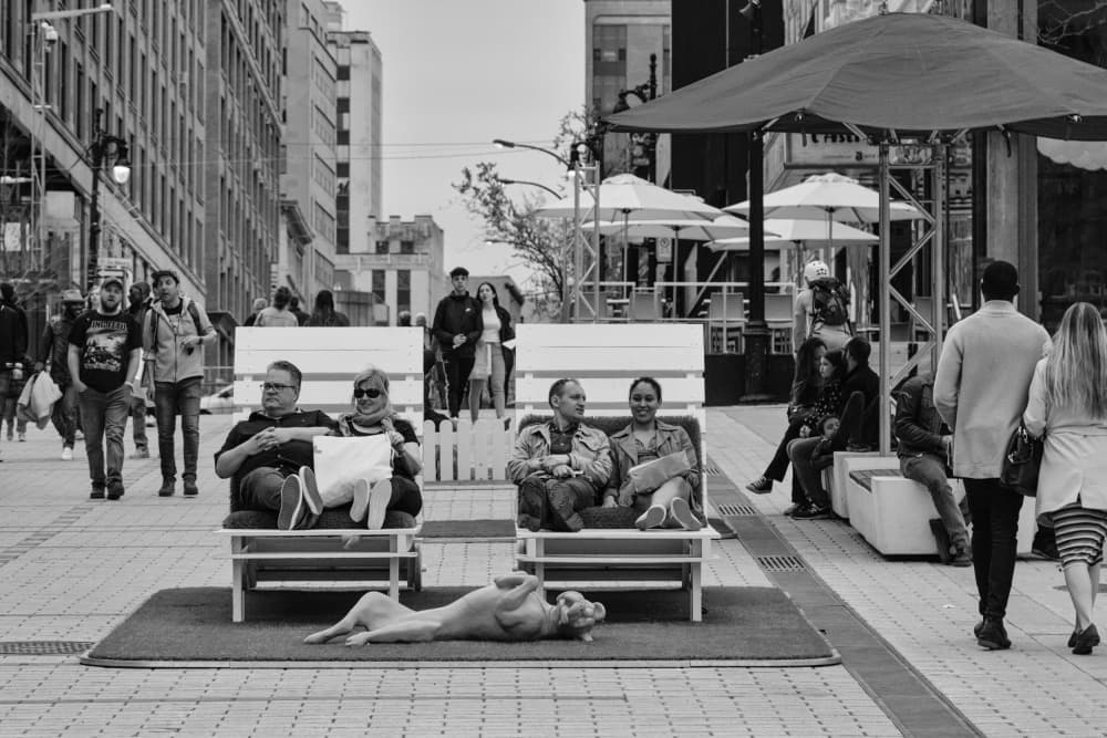 Street Life Relaxed by Michelle Degryse — canvas wall art