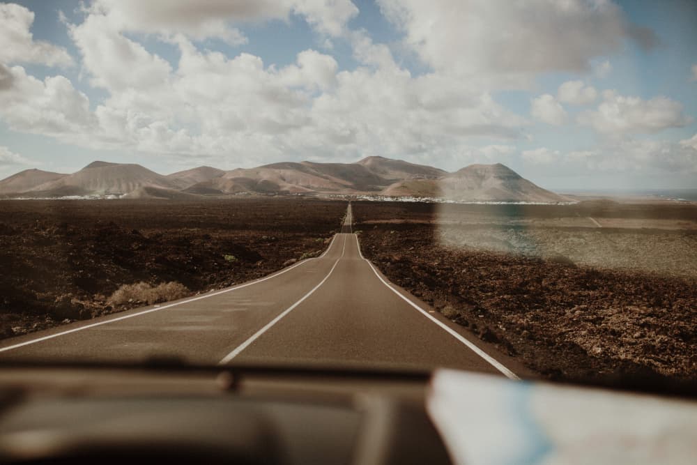 Vast Desert Road Journey by Claudia Casal — canvas wall art