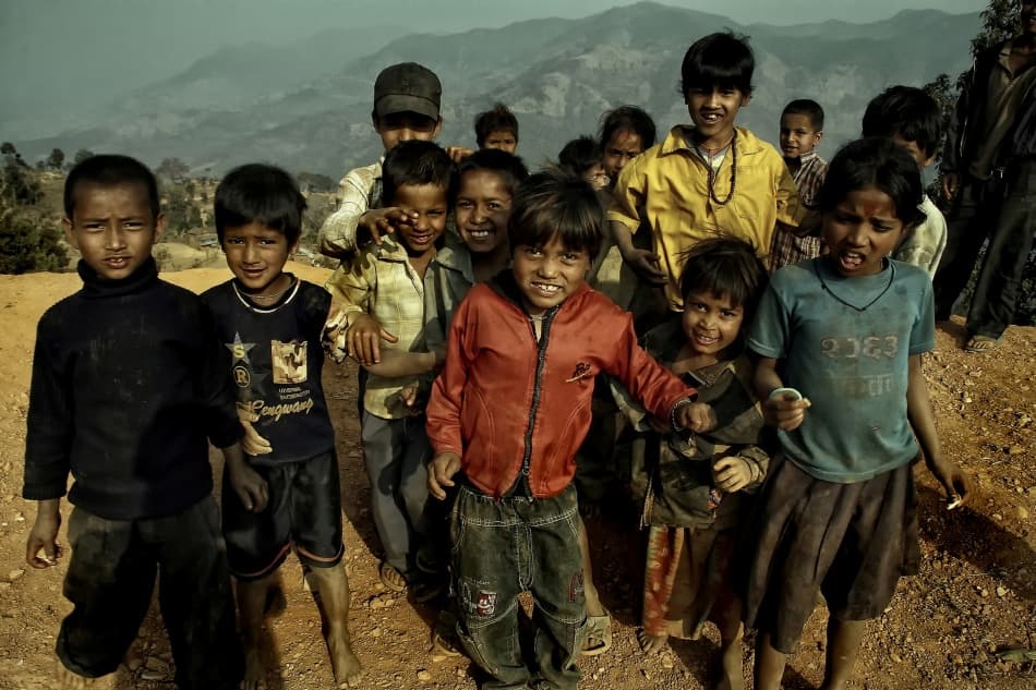 Smiling Village Children by Yvette Depaepe — canvas wall art