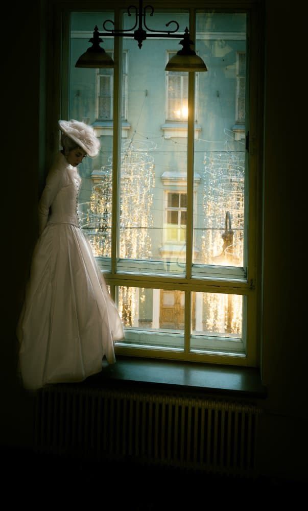 Elegant Woman Window by Oles Paritskiy — canvas wall art