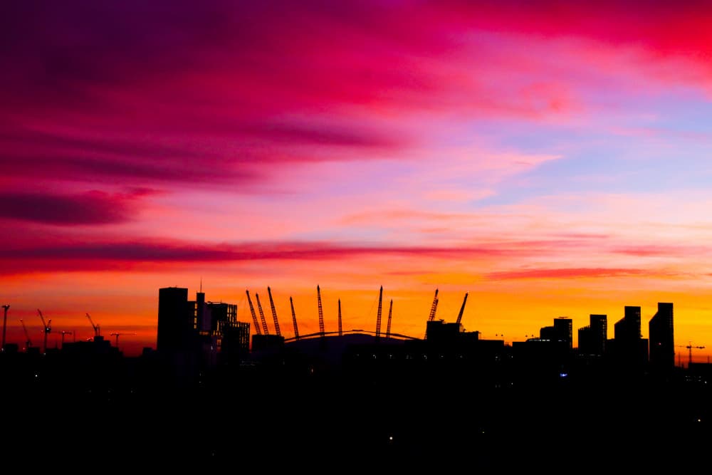 Vibrant City Sunset by Patrick Muthui — canvas wall art