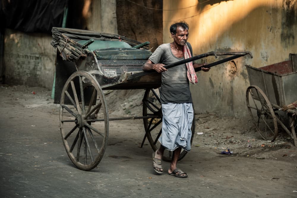 Man and Rickshaw by Trevor Cole — canvas wall art