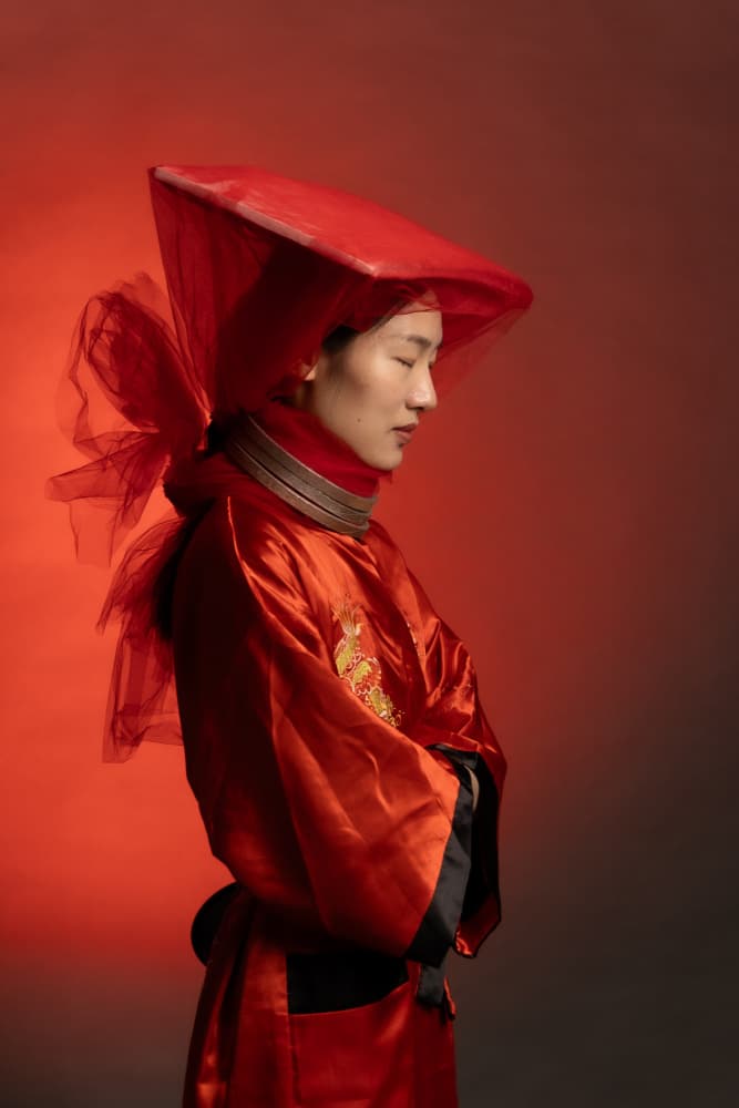 Elegant Red Cultural Portrait by Gila Koller — canvas wall art