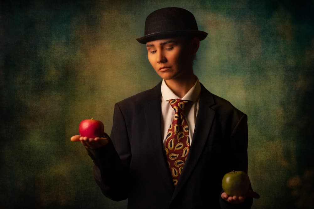 Gentleman With Apples by Amnon Eichelberg — canvas wall art