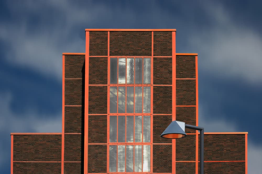 Geometric Building Against Sky by Hans-Wolfgang Hawerkamp — canvas wall art