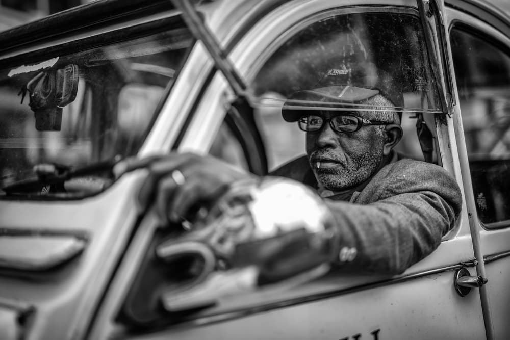 Vintage Driver Portrait by Marco Tagliarino — canvas wall art