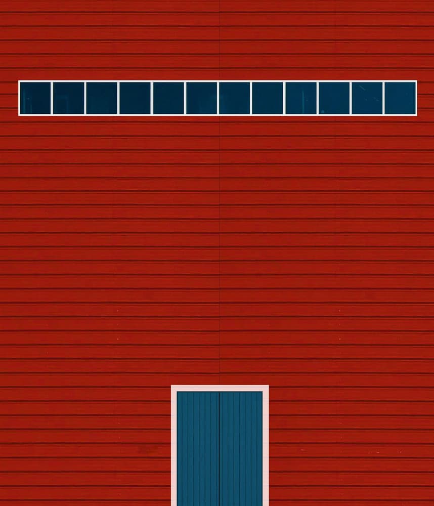 Red Wall Blue Door by Arnon Orbach — canvas wall art