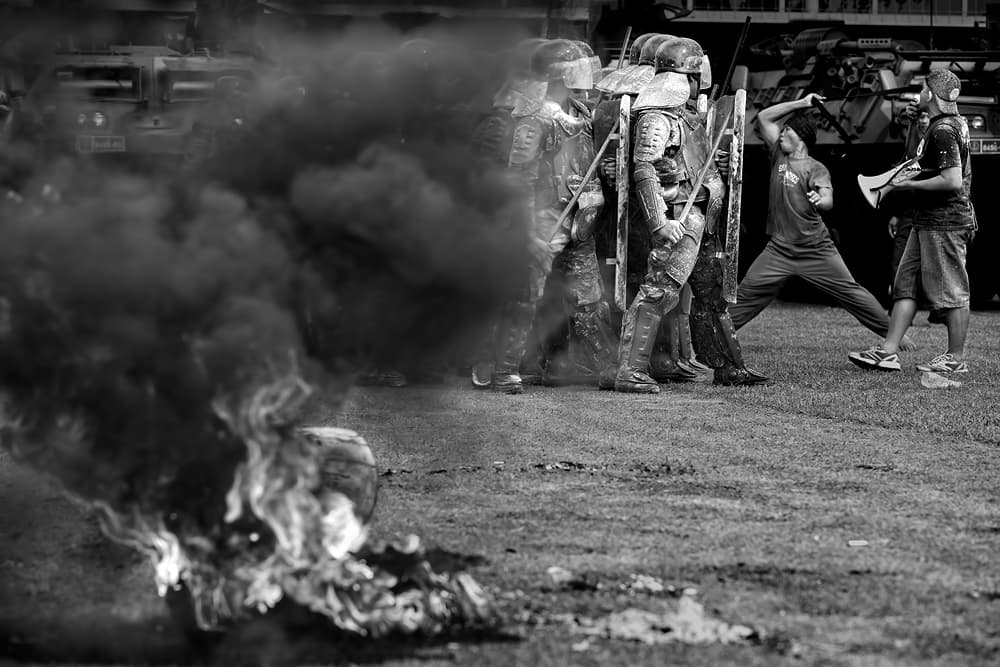 Riot Smoke Confrontation by Gunarto Song — canvas wall art