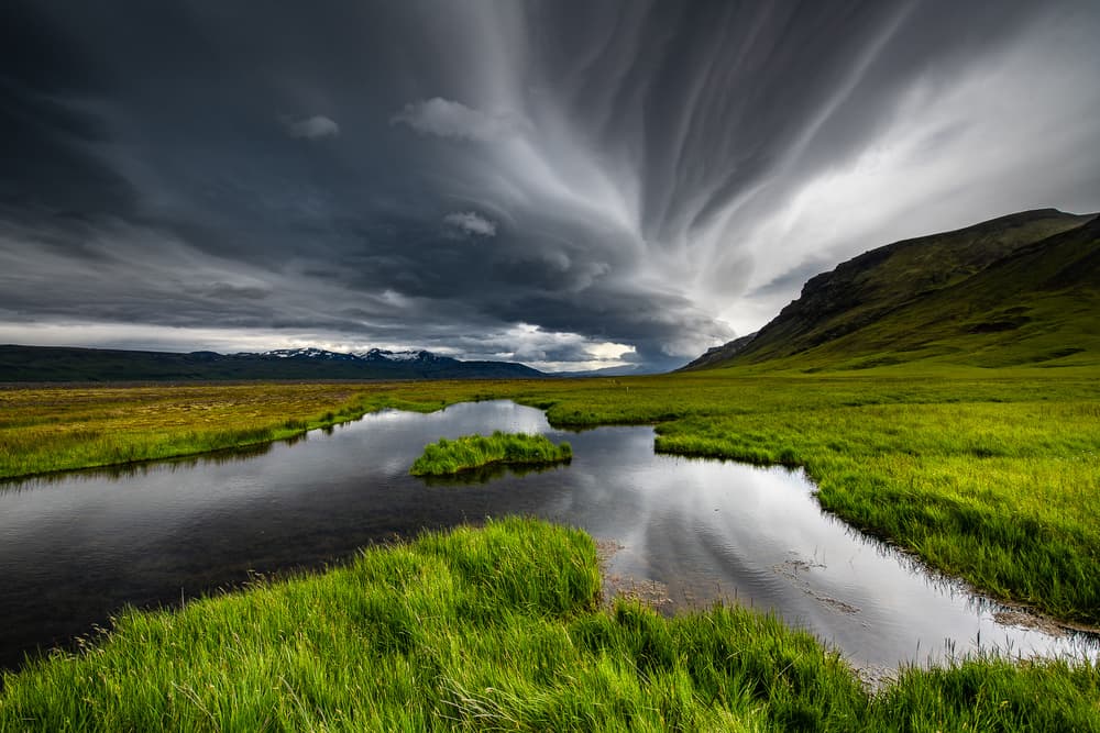 Green Valley Dramatic Sky by Marc Pelissier — canvas wall art