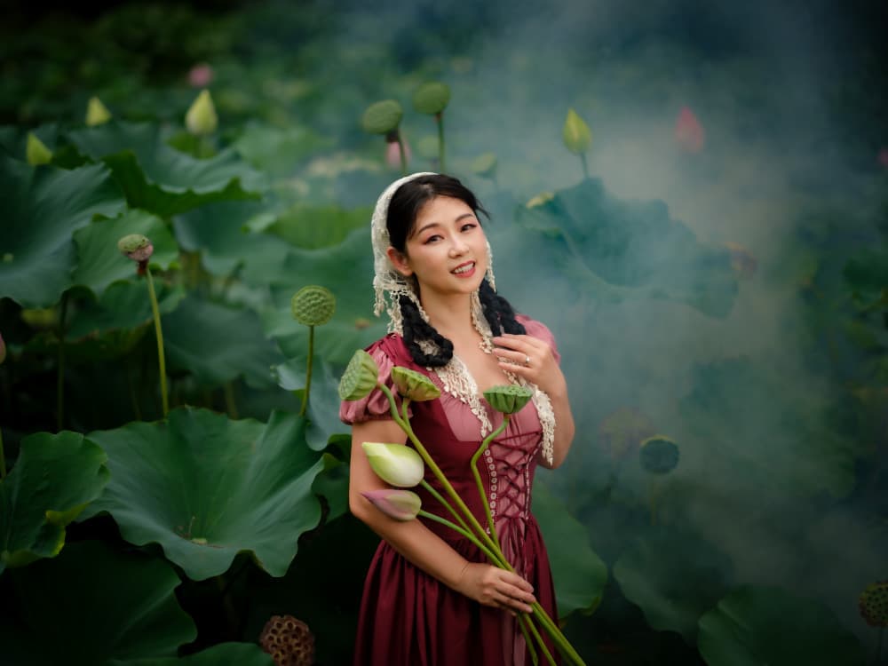 Woman in Lotus Mist by Jeff Wang — canvas wall art