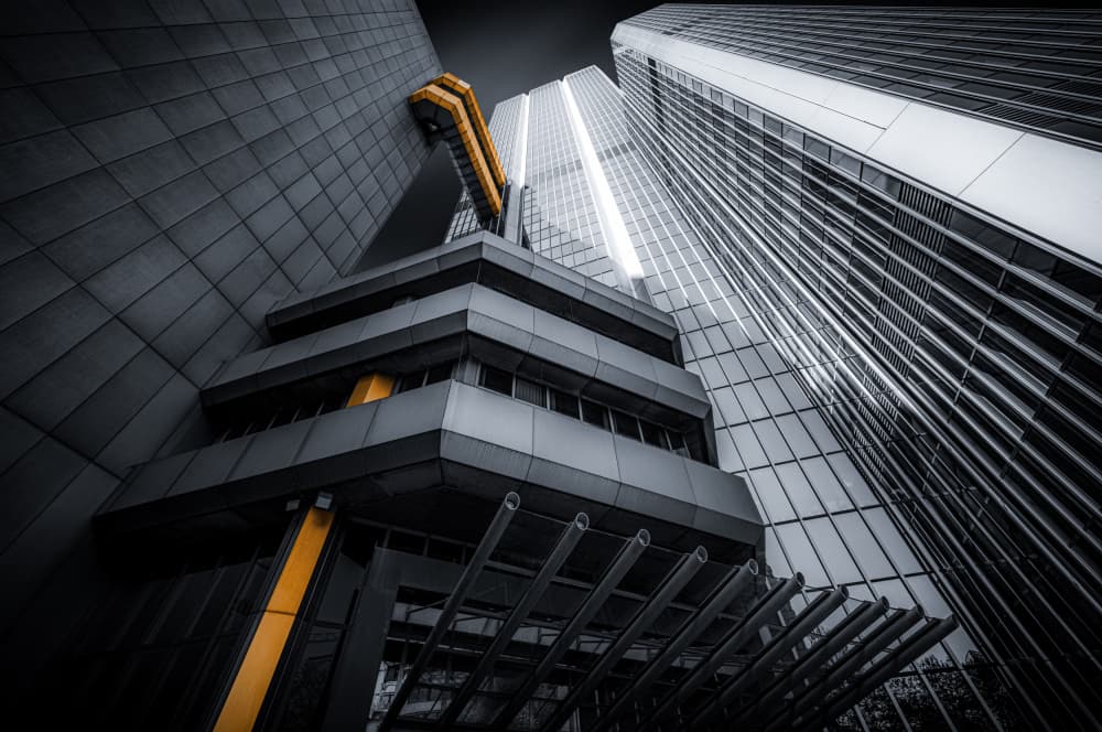 Sleek Urban Yellow Buildings by Roland M Schwerdtfeger — canvas wall art