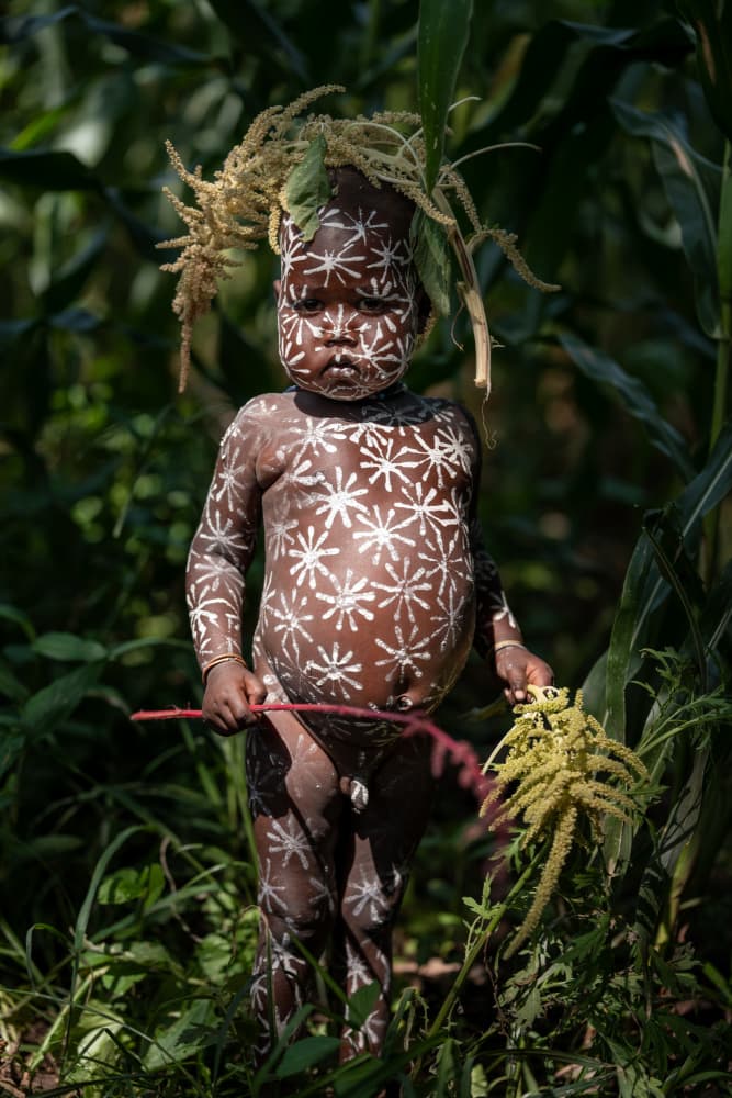 Painted Tribal Child by HuongHoang — canvas wall art