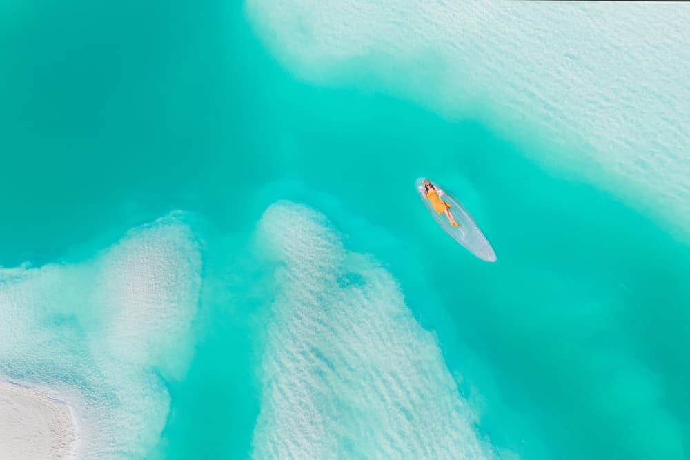 Turquoise Water Paddleboarding by Simoon — canvas wall art