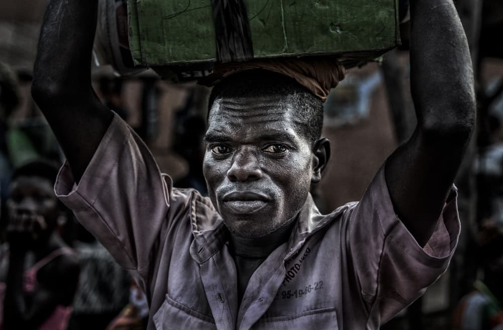 Focused African Carrier by Joxe Inazio Kuesta Garmendia — canvas wall art