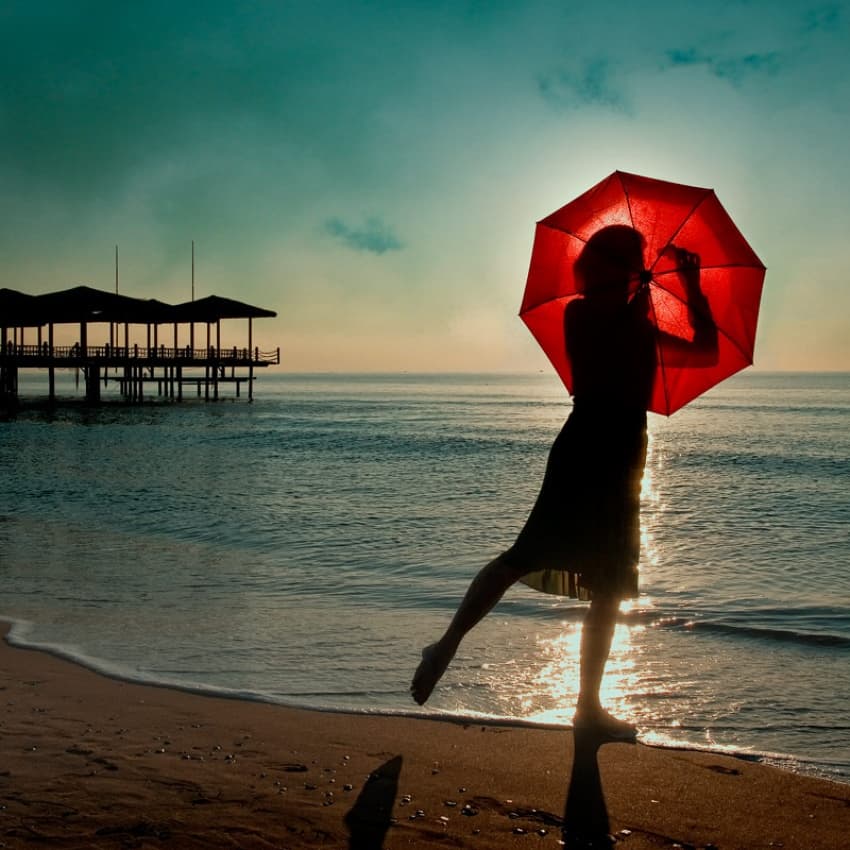 Romantic Sunset Red Umbrella by ambra — canvas wall art