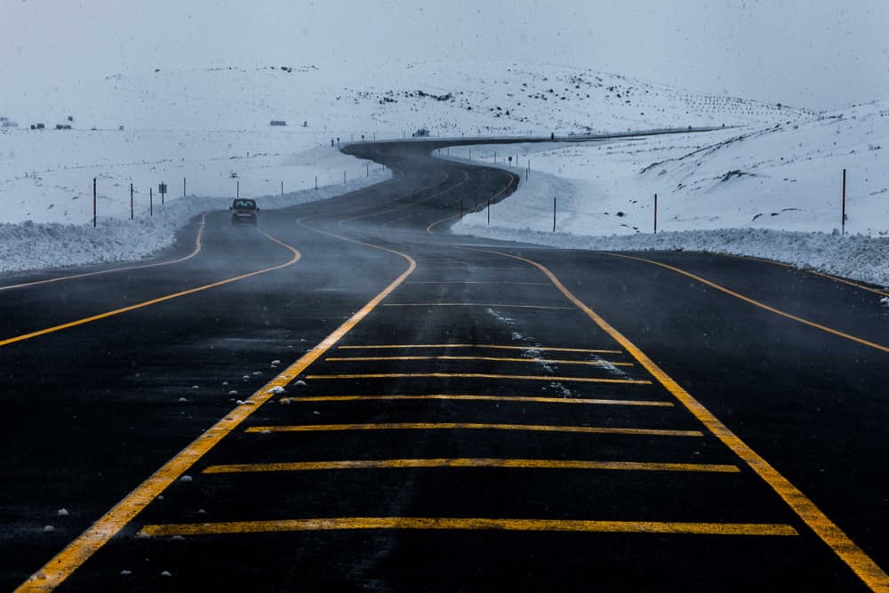 Winding Winter Road by Ramiz Sahin — canvas wall art