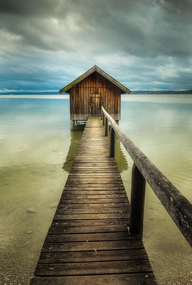 Rustic Lake Boathouse Pier by Ulrike Eisenmann — canvas wall art