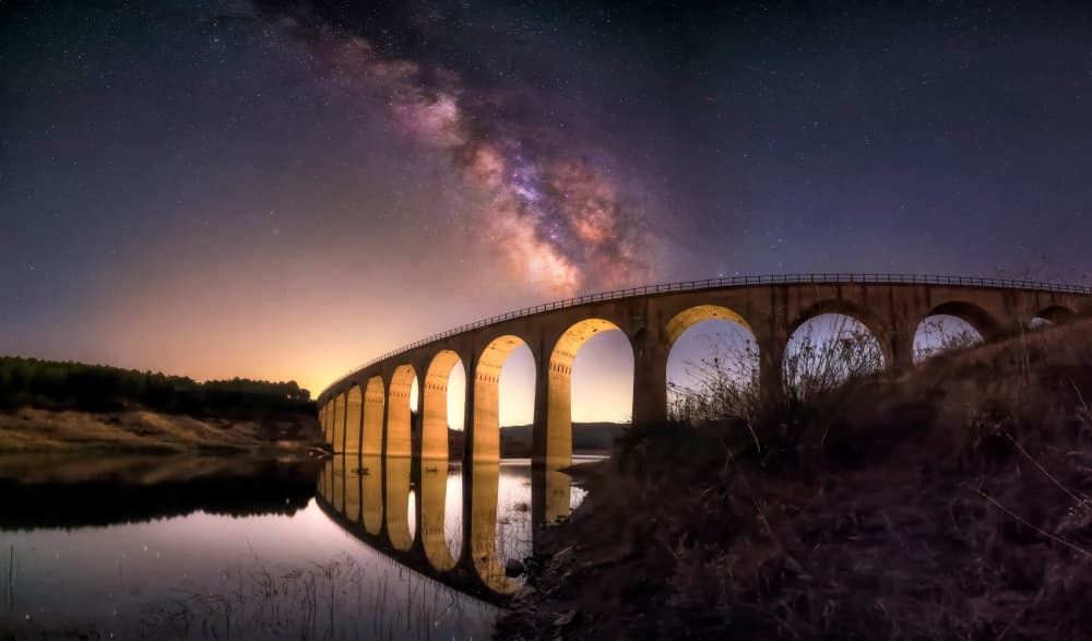 Milky Way Bridge Reflection by Juan Luis Seco — canvas wall art