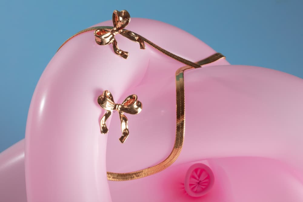 Glossy Pink Golden Bows by Julia Ramiro — canvas wall art