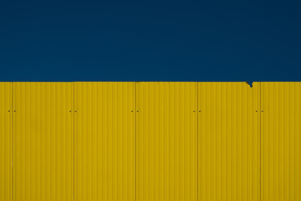 Vibrant Blue Yellow Wall by Rolf Endermann — canvas wall art