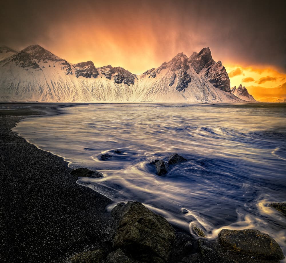 Black Beach Mountain Sunset by Raimondo Restelli — canvas wall art
