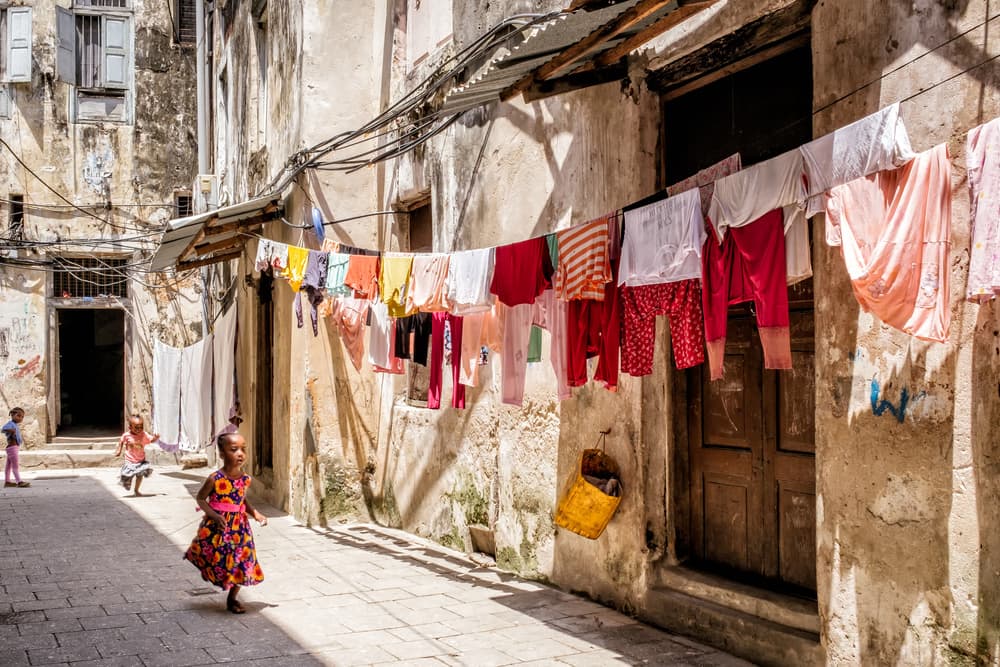 Vibrant Alley Life by Gloria Salgado Gispert — canvas wall art