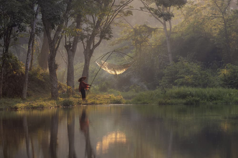 Misty Morning Fisherman by Sally Widjaja — canvas wall art