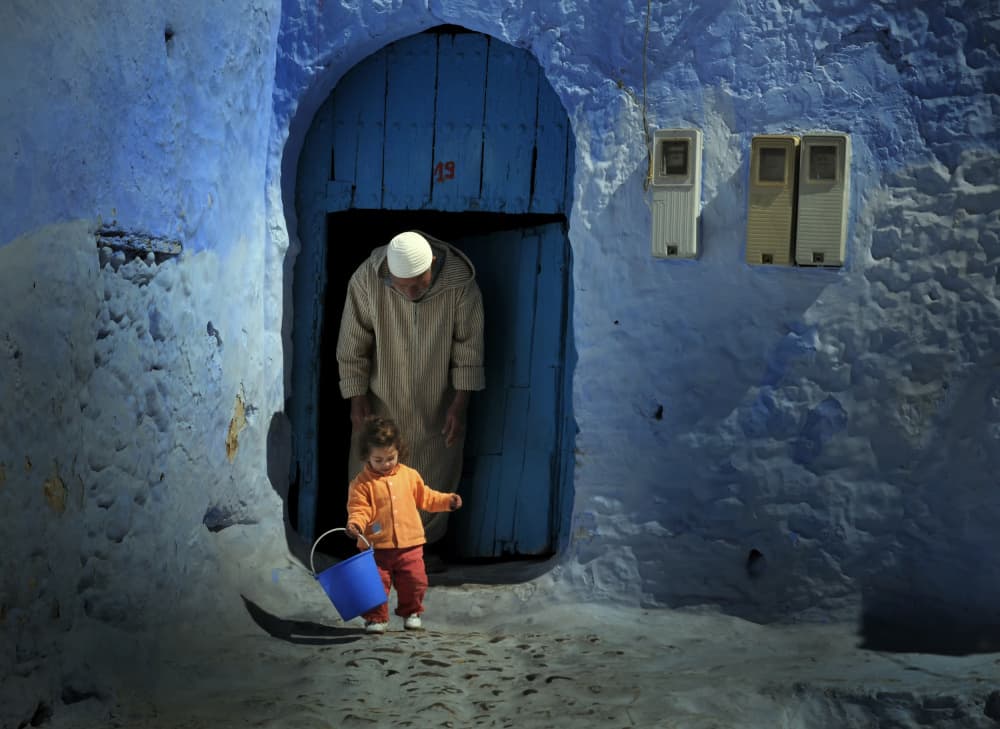 Moroccan Blue Street Life by Lou Urlings — canvas wall art