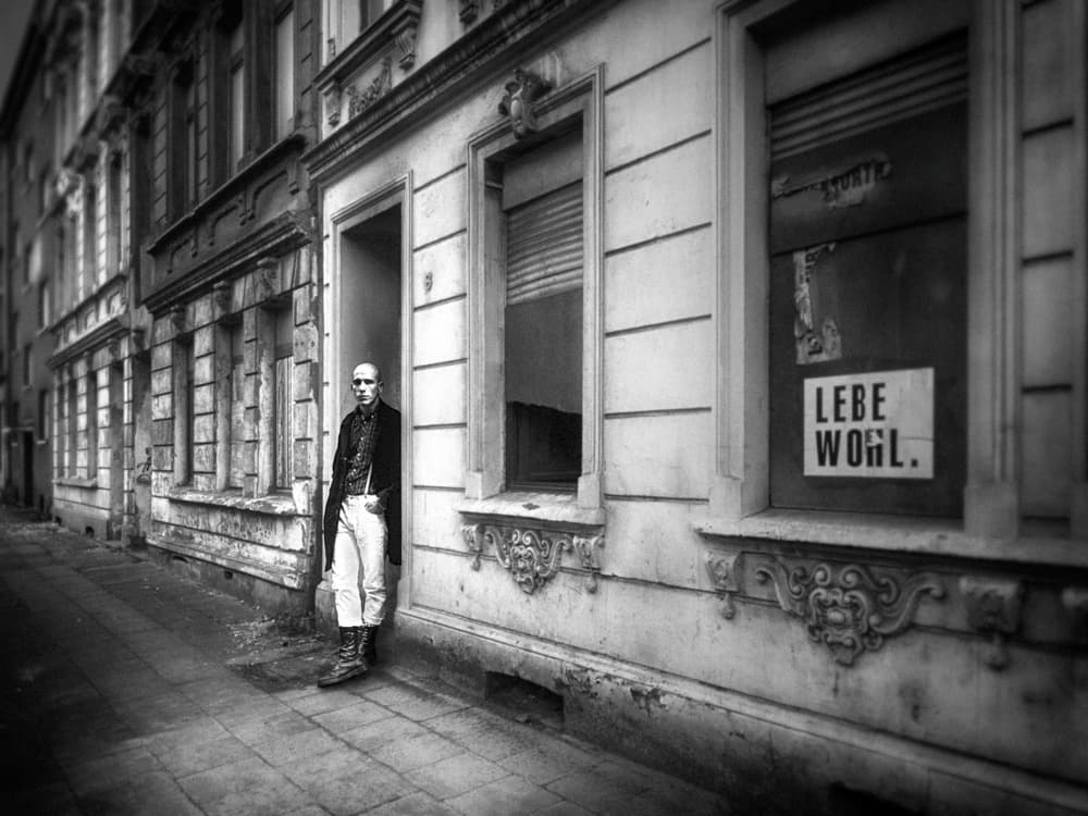 Lebe Wohl Street Figure by Holger Droste — canvas wall art
