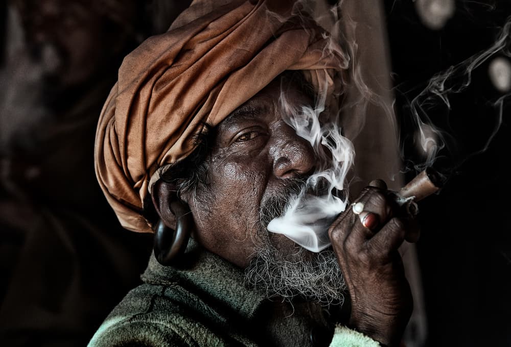 Contemplative Man Smoking by Joxe Inazio Kuesta Garmendia — canvas wall art