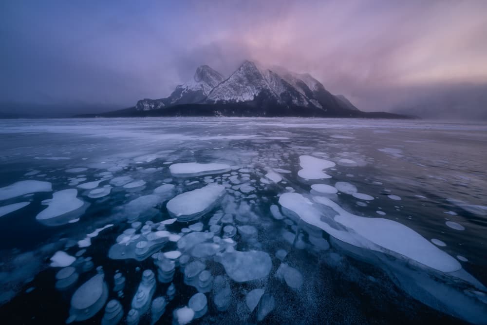 Frozen Lake Bubbles Mountain by Yuan Su — canvas wall art