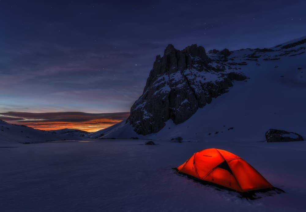 Glowing Winter Camp by Carlos Gonzalez — canvas wall art