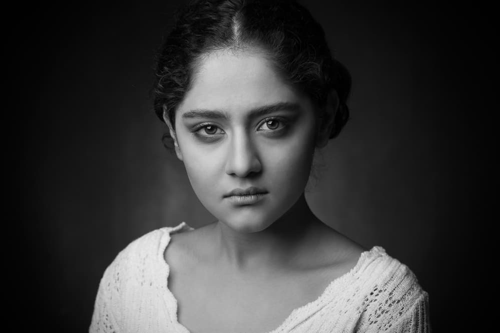 Intense Young Woman by Mehdi Mokhtari — canvas wall art
