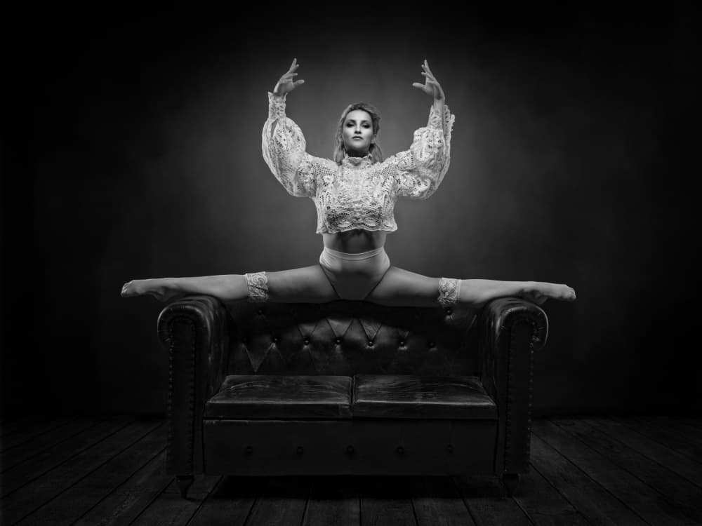 Elegant Splits on Couch by Luc Stalmans — canvas wall art