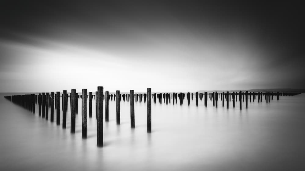 Tranquil Ocean Pillars by Christophe Staelens — canvas wall art