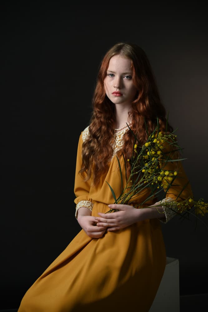 Pensive Girl Golden Flowers by Iris Resch — canvas wall art