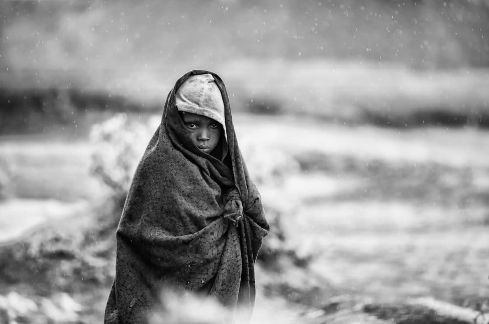 Solemn Child's Gaze by Goran Jovic — canvas wall art