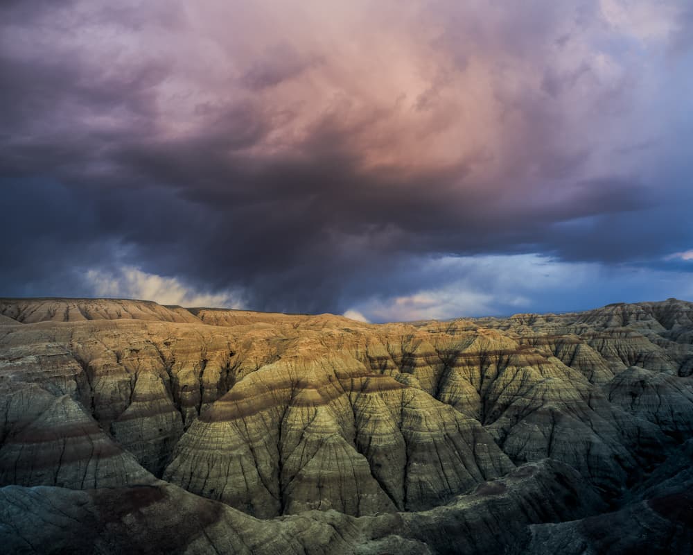 Colorful Storm Over Badlands by John Fan — canvas wall art
