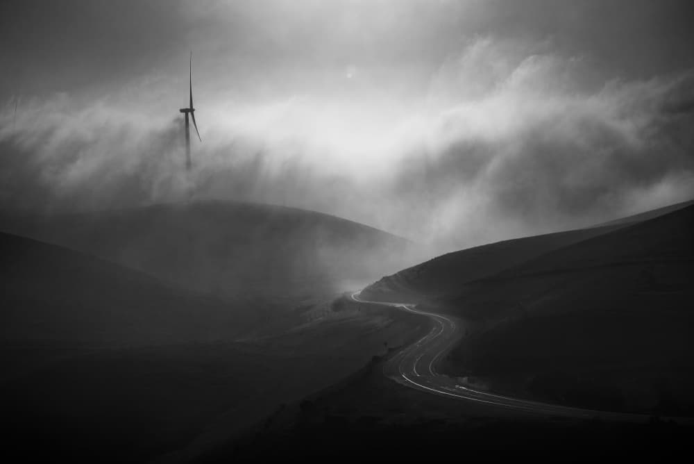 Misty Wind Turbine Road by Ryan Li — canvas wall art