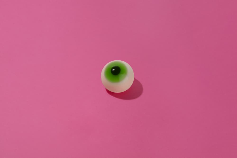 Green Eyeball Treat by Julia Ramiro — canvas wall art