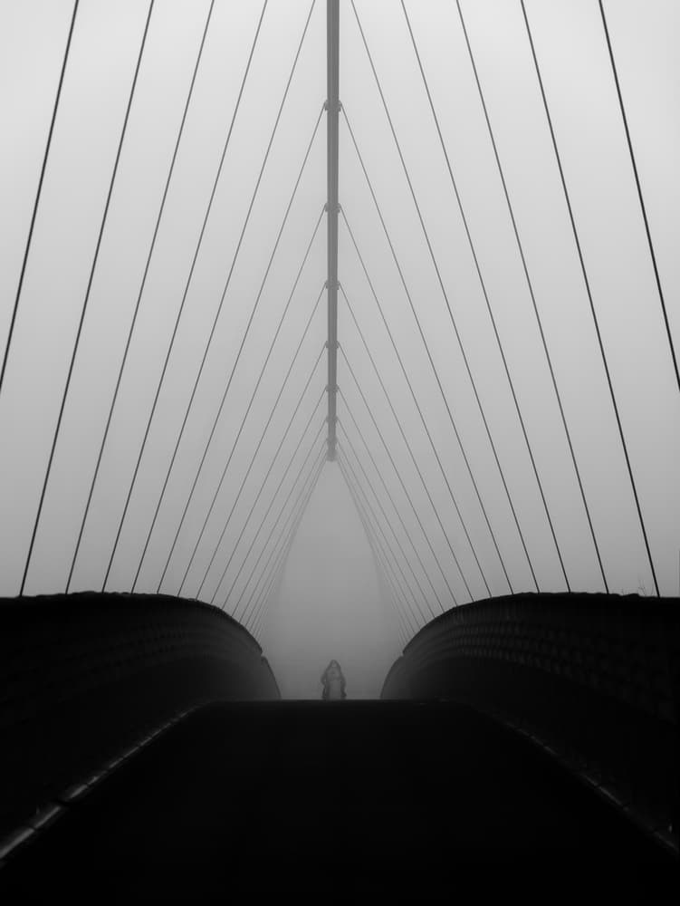 Foggy Bridge Silhouette by Marius Surleac — canvas wall art