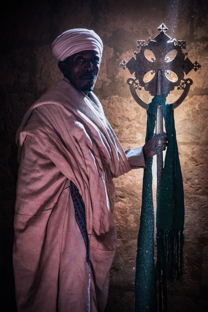 Ethiopian Priest with Cross by Linda Wride — canvas wall art