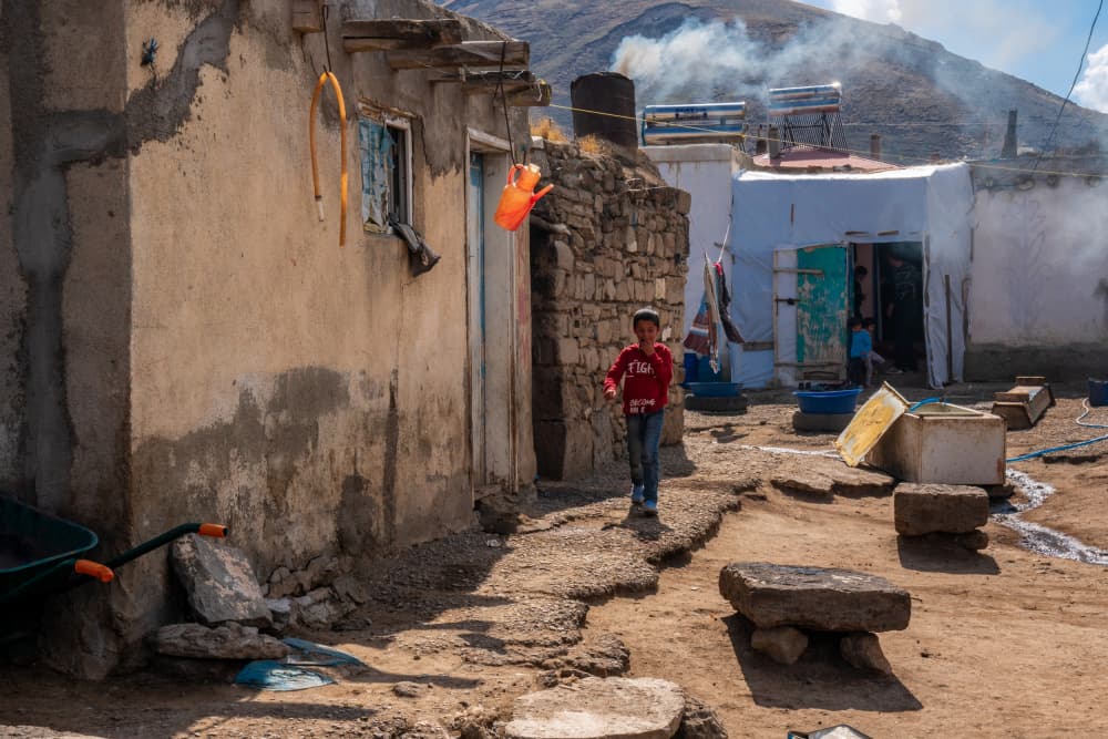 Village Boy Running by Corinne Spector — canvas wall art