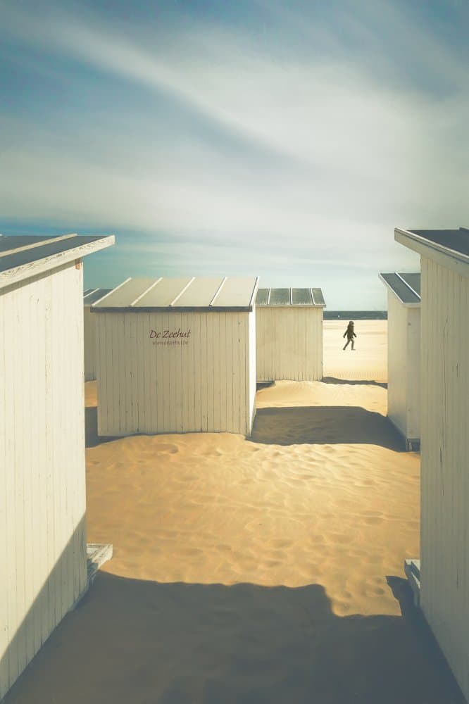 White Beach Huts Solitude by Marc Huybrighs — canvas wall art